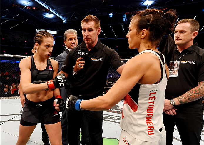 MELBOURNE, AUSTRALIA - NOVEMBER 15: Joanna Jedrzejczyk (L) and Valerie Letourneau (R) touch gloves before the start of their UFC women's strawweight championship bout during the UFC 193 event at Etihad Stadium on November 15, 2015 in Melbourne, Australia