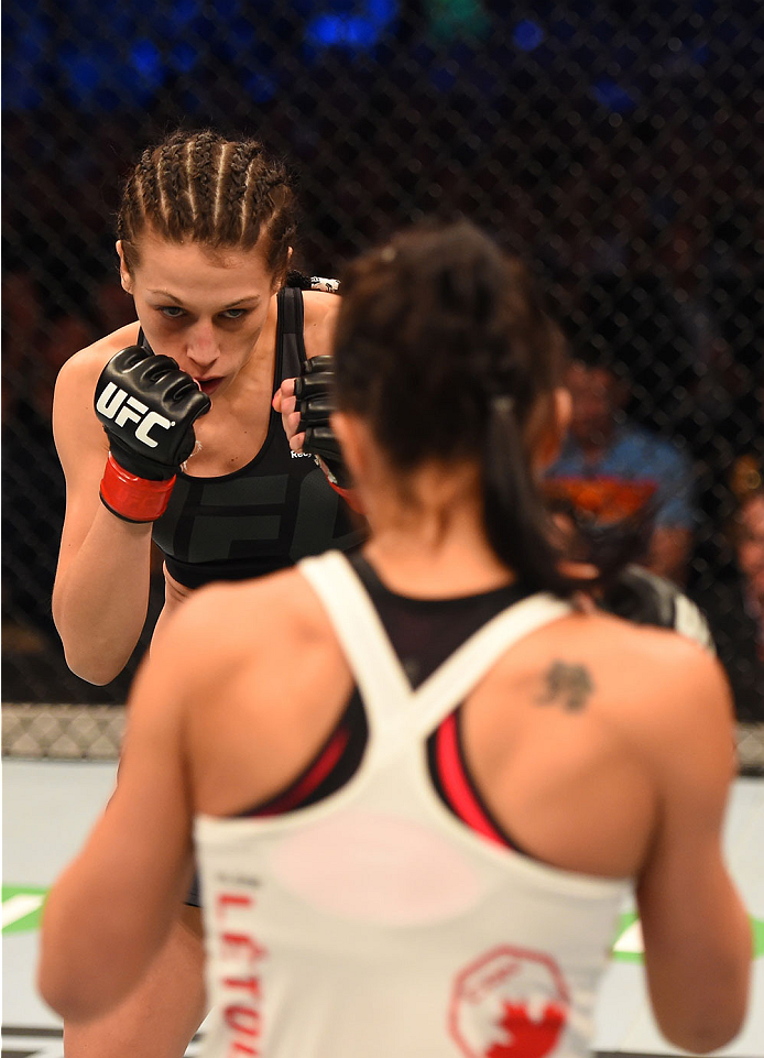 MELBOURNE, AUSTRALIA - NOVEMBER 15: Joanna Jedrzejczyk (L) and Valerie Letourneau (R) size eachother up in their UFC women's strawweight championship bout during the UFC 193 event at Etihad Stadium on November 15, 2015 in Melbourne, Australia. (Photo by