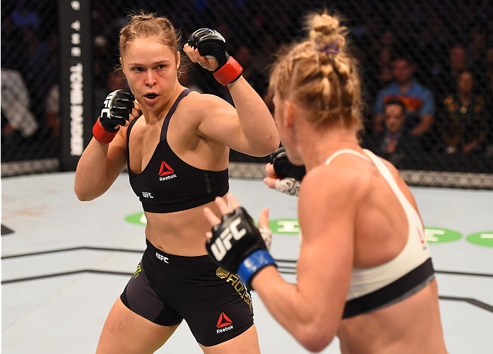 MELBOURNE, AUSTRALIA - NOVEMBER 15: (L-R) Ronda Rousey and Holly Holm size each other up in the first round in their UFC women's bantamweight championship bout during the UFC 193 event at Etihad Stadium on November 15, 2015 in Melbourne, Australia. (Pho