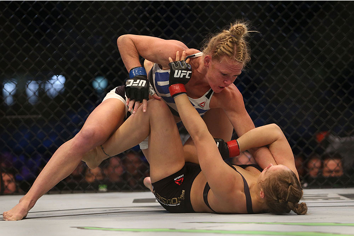 MELBOURNE, AUSTRALIA - NOVEMBER 15: Ronda Rousey of the United States (R) and Holly Holm of the United States compete in their UFC women's bantamweight championship bout during the UFC 193 event at Etihad Stadium on November 15, 2015 in Melbourne, Austr