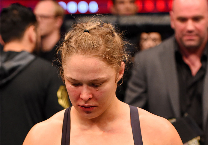 MELBOURNE, AUSTRALIA - NOVEMBER 15: Ronda Rousey looks on after losing her championship title by KO (head kick and punches) to Holly Holm (not pictured) in two rounds of their UFC women's bantamweight championship bout during the UFC 193 event at Etihad