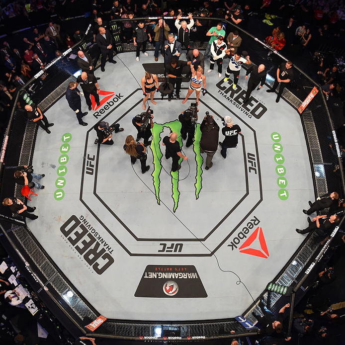 MELBOURNE, AUSTRALIA - NOVEMBER 15: An overhead view of the Octagon as Holly Holm celebrates after her knockout victory over Ronda Rousey in their UFC women's bantamweight championship bout during the UFC 193 event at Etihad Stadium on November 15, 2015