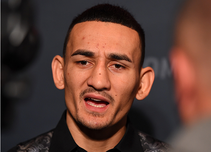 LAS VEGAS, NV - DECEMBER 09: Max Holloway interacts with media during the UFC Ultimate Media Day at MGM Grand Hotel & Casino on December 9, 2015 in Las Vegas, Nevada. (Photo by Josh Hedges/Zuffa LLC/Zuffa LLC via Getty Images)