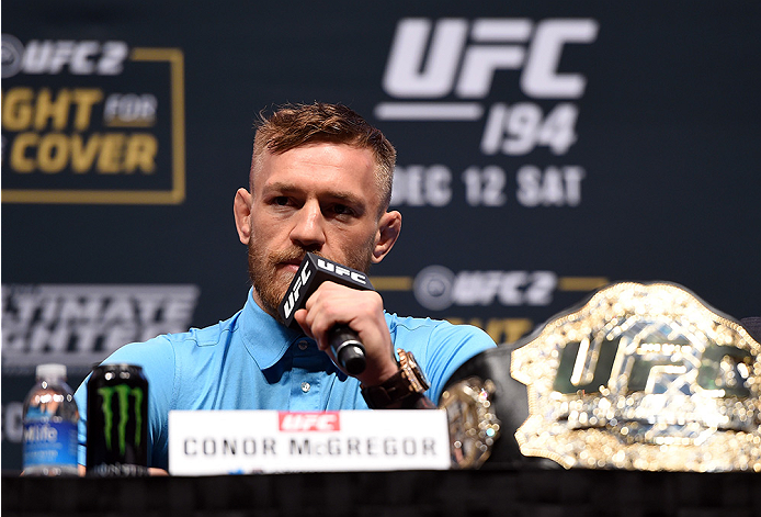 LAS VEGAS, NV - DECEMBER 09: Conor McGregor of Ireland interacts with media during the UFC Press Conference inside MGM Grand Garden Arena on December 9, 2015 in Las Vegas, Nevada. (Photo by Josh Hedges/Zuffa LLC/Zuffa LLC via Getty Images)