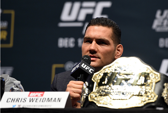 LAS VEGAS, NV - DECEMBER 09: UFC middleweight champion Chris Weidman interacts with media during the UFC Press Conference inside MGM Grand Garden Arena on December 9, 2015 in Las Vegas, Nevada. (Photo by Josh Hedges/Zuffa LLC/Zuffa LLC via Getty Images)