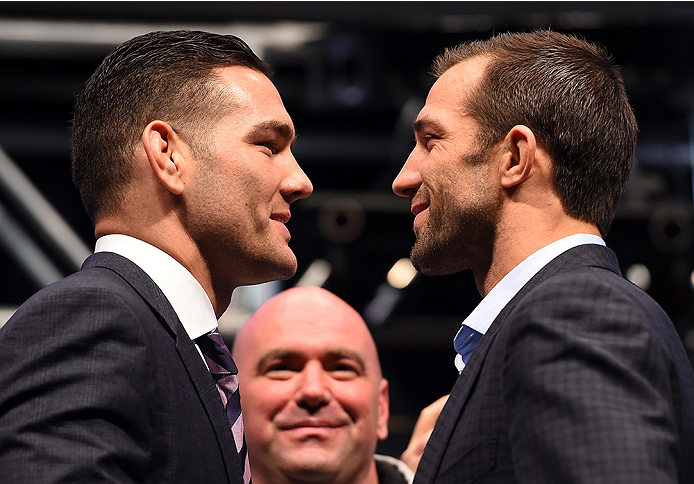 LAS VEGAS, NV - DECEMBER 09: (L-R) Opponents Chris Weidman and Luke Rockhold face off during the UFC Press Conference inside MGM Grand Garden Arena on December 9, 2015 in Las Vegas, Nevada. (Photo by Josh Hedges/Zuffa LLC/Zuffa LLC via Getty Images)