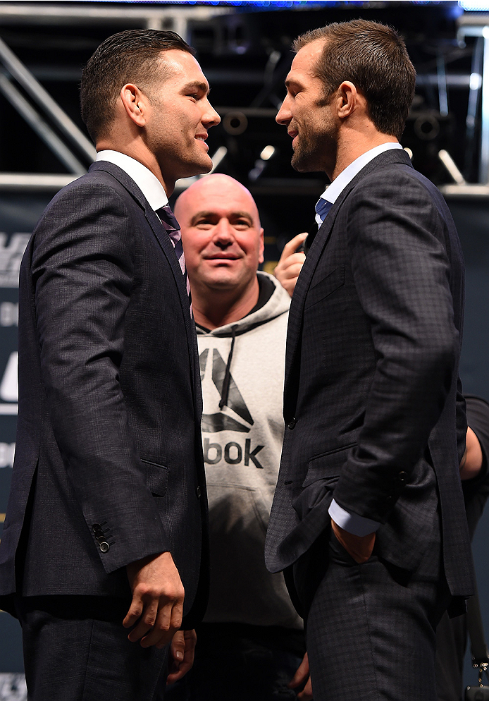LAS VEGAS, NV - DECEMBER 09: (L-R) Opponents Chris Weidman and Luke Rockhold face off during the UFC Press Conference inside MGM Grand Garden Arena on December 9, 2015 in Las Vegas, Nevada. (Photo by Josh Hedges/Zuffa LLC/Zuffa LLC via Getty Images)