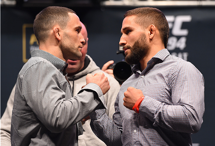 LAS VEGAS, NV - DECEMBER 09: (L-R) Opponents Frankie Edgar and Chad Mendes face off during the UFC Press Conference inside MGM Grand Garden Arena on December 9, 2015 in Las Vegas, Nevada. (Photo by Josh Hedges/Zuffa LLC/Zuffa LLC via Getty Images)