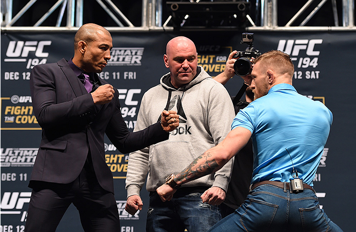 LAS VEGAS, NV - DECEMBER 09: (L-R) Opponents Jose Aldo of Brazil and Conor McGregor of Ireland face off during the UFC Press Conference inside MGM Grand Garden Arena on December 9, 2015 in Las Vegas, Nevada. (Photo by Josh Hedges/Zuffa LLC/Zuffa LLC via