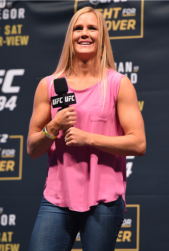 LAS VEGAS, NV - DECEMBER 11: UFC women's bantamweight champion Holly Holm interacts with fans during a Q&A session before the UFC 194 weigh-in inside MGM Grand Garden Arena on December 10, 2015 in Las Vegas, Nevada. (Photo by Josh Hedges/Zuffa LLC/Zuff