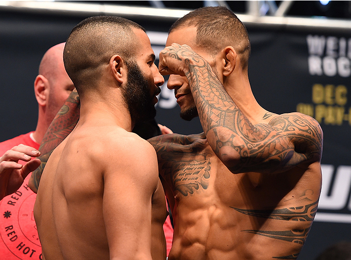 LAS VEGAS, NV - DECEMBER 11: (L-R) Opponents John Makdessi of Canada and Yancy Medeiros face off during the UFC 194 weigh-in inside MGM Grand Garden Arena on December 10, 2015 in Las Vegas, Nevada. (Photo by Josh Hedges/Zuffa LLC/Zuffa LLC via Getty Im