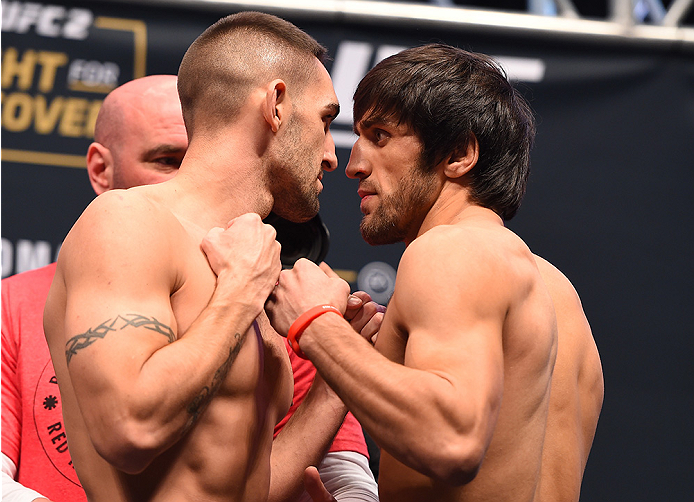 LAS VEGAS, NV - DECEMBER 11: (L-R) Opponents Joe Proctor and Magomed Mustafaev of Russia face off during the UFC 194 weigh-in inside MGM Grand Garden Arena on December 10, 2015 in Las Vegas, Nevada. (Photo by Josh Hedges/Zuffa LLC/Zuffa LLC via Getty I