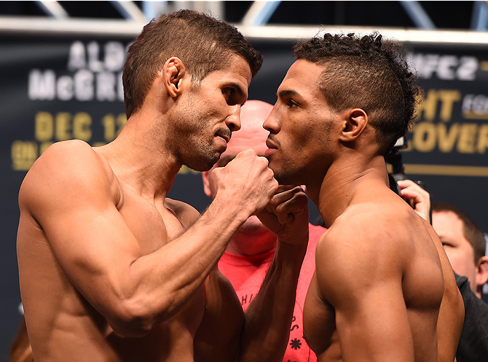LAS VEGAS, NV - DECEMBER 11: (L-R) Opponents Leonardo Santos of Brazil and Kevin Lee face off during the UFC 194 weigh-in inside MGM Grand Garden Arena on December 10, 2015 in Las Vegas, Nevada. (Photo by Josh Hedges/Zuffa LLC/Zuffa LLC via Getty Image
