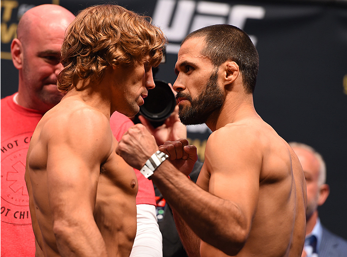 LAS VEGAS, NV - DECEMBER 11: (L-R) Opponents Urijah Faber and Frankie Saenz face off during the UFC 194 weigh-in inside MGM Grand Garden Arena on December 10, 2015 in Las Vegas, Nevada. (Photo by Josh Hedges/Zuffa LLC/Zuffa LLC via Getty Images)