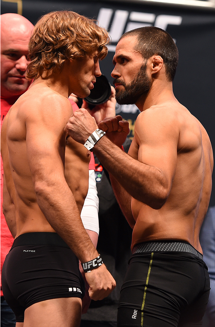 LAS VEGAS, NV - DECEMBER 11: (L-R) Opponents Urijah Faber and Frankie Saenz face off during the UFC 194 weigh-in inside MGM Grand Garden Arena on December 10, 2015 in Las Vegas, Nevada. (Photo by Josh Hedges/Zuffa LLC/Zuffa LLC via Getty Images)