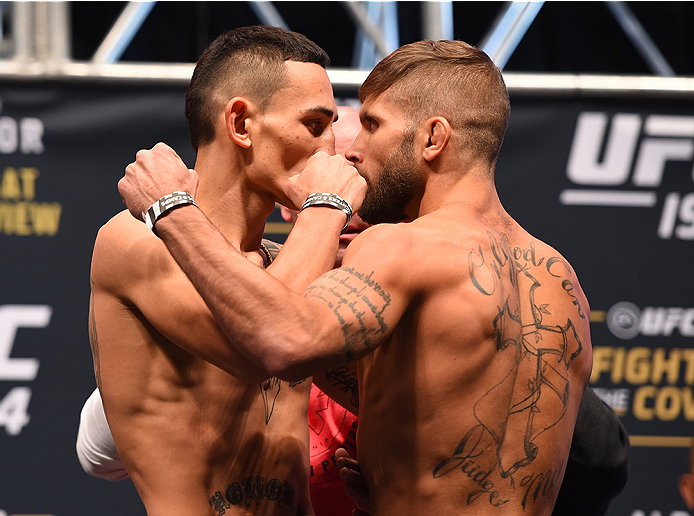 LAS VEGAS, NV - DECEMBER 11: (L-R) Opponents Max Holloway and Jeremy Stephens face off during the UFC 194 weigh-in inside MGM Grand Garden Arena on December 10, 2015 in Las Vegas, Nevada. (Photo by Josh Hedges/Zuffa LLC/Zuffa LLC via Getty Images)
