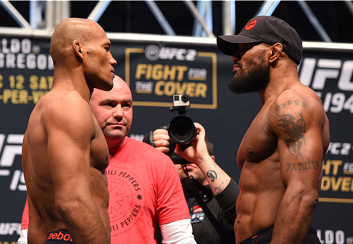 LAS VEGAS, NV - DECEMBER 11: (L-R) Opponents Ronaldo 'Jacare' Souza of Brazil and Yoel Romero of Cuba face off during the UFC 194 weigh-in inside MGM Grand Garden Arena on December 10, 2015 in Las Vegas, Nevada. (Photo by Josh Hedges/Zuffa LLC/Zuffa LL