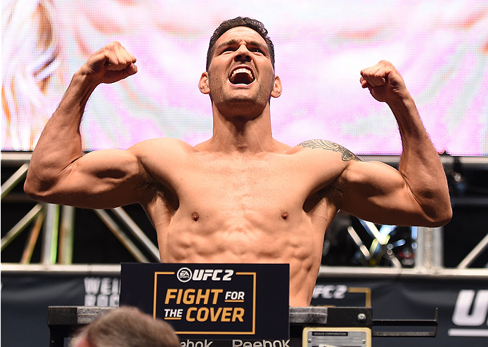 LAS VEGAS, NV - DECEMBER 11: UFC middleweight champion Chris Weidman weighs in during the UFC 194 weigh-in inside MGM Grand Garden Arena on December 10, 2015 in Las Vegas, Nevada. (Photo by Josh Hedges/Zuffa LLC/Zuffa LLC via Getty Images)
