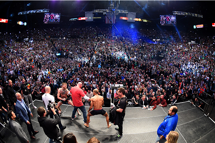 LAS VEGAS, NV - DECEMBER 11: (R-L) UFC featherweight champion Jose Aldo of Brazil and interim UFC featherweight champion Conor McGregor of Ireland face off during the UFC 194 weigh-in inside MGM Grand Garden Arena on December 10, 2015 in Las Vegas, Nevad