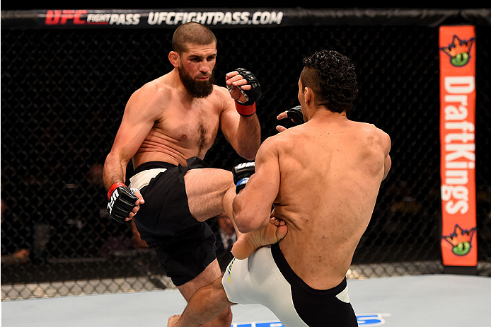 LAS VEGAS, NV - DECEMBER 12: Court McGee kicks Marcio Alexandre of Brazil in their welterweight bout during the UFC 194 event inside MGM Grand Garden Arena on December 12, 2015 in Las Vegas, Nevada. (Photo by Josh Hedges/Zuffa LLC/Zuffa LLC via Getty Ima