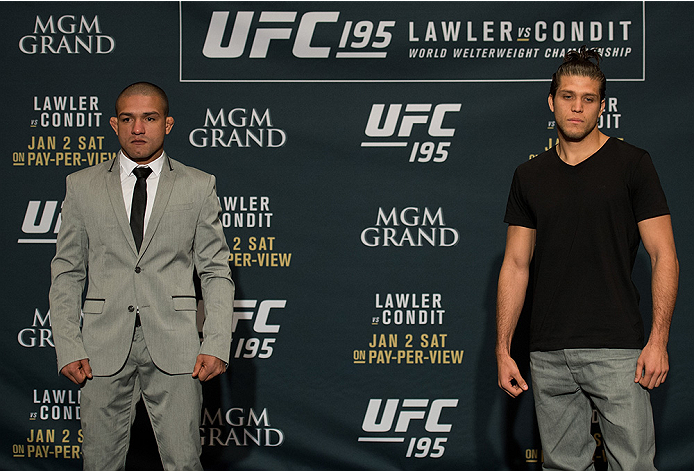 LAS VEGAS, NEVADA - DECEMBER 31: (L-R) Diego Brandao and Brian Ortega pose for a photo after facing off during the Ultimate Media Day at the MGM Grand Hotel/Casino on December 31, 2015 in Las Vegas Nevada. (Photo by Brandon Magnus/Zuffa LLC/Zuffa LLC via