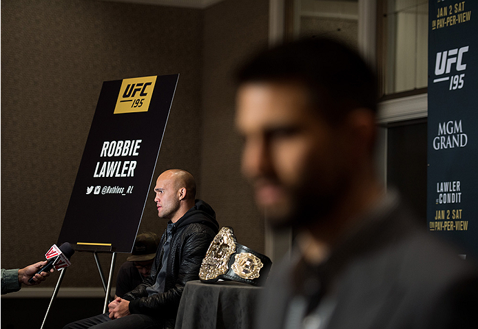 LAS VEGAS, NEVADA - DECEMBER 31: (L-R) UFC welterweight champion Robbie Lawler and Carlos Condit speak to the media during the Ultimate Media Day at the MGM Grand Hotel/Casino on December 31, 2015 in Las Vegas Nevada. (Photo by Brandon Magnus/Zuffa LLC/Z