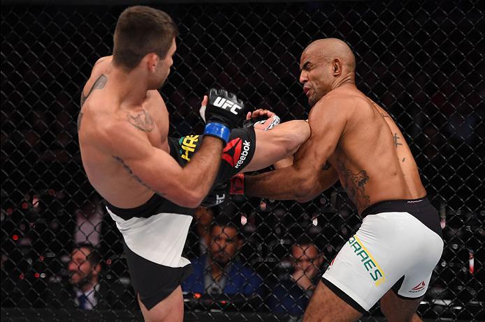 CURITIBA, BRAZIL - MAY 14: (L-R) Luan Chagas of Brazil kicks Sergio Moraes of Brazil in their welterweight bout during the UFC 198 event at Arena da Baixada stadium on May 14, 2016 in Curitiba, Parana, Brazil. (Photo by Josh Hedges/Zuffa LLC/Zuffa LLC v