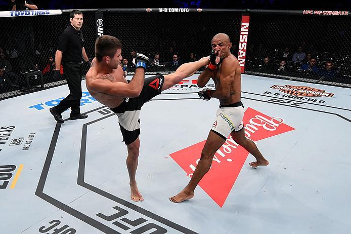 CURITIBA, BRAZIL - MAY 14: (L-R) Luan Chagas of Brazil kicks Sergio Moraes of Brazil in their welterweight bout during the UFC 198 event at Arena da Baixada stadium on May 14, 2016 in Curitiba, Parana, Brazil. (Photo by Josh Hedges/Zuffa LLC/Zuffa LLC v