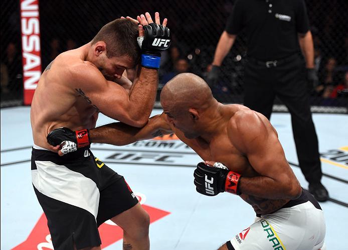 CURITIBA, BRAZIL - MAY 14: (R-L) Sergio Moraes of Brazil punches Luan Chagas of Brazil in their welterweight bout during the UFC 198 event at Arena da Baixada stadium on May 14, 2016 in Curitiba, Parana, Brazil. (Photo by Josh Hedges/Zuffa LLC/Zuffa LLC