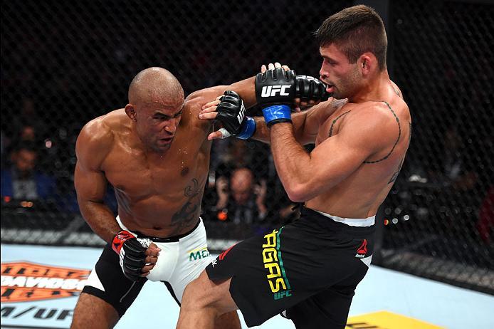 CURITIBA, BRAZIL - MAY 14: (L-R) Sergio Moraes of Brazil punches Luan Chagas of Brazil in their welterweight bout during the UFC 198 event at Arena da Baixada stadium on May 14, 2016 in Curitiba, Parana, Brazil. (Photo by Josh Hedges/Zuffa LLC/Zuffa LLC