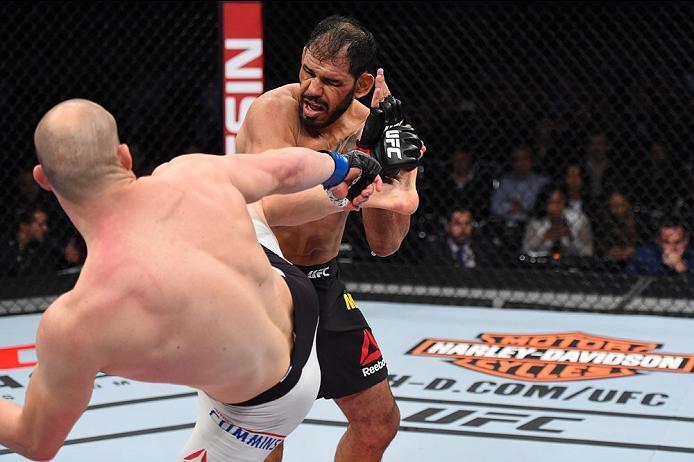 CURITIBA, BRAZIL - MAY 14: (L-R) Patrick Cummins kicks Antonio Rogerio Nogueira of Brazil in their light heavyweight bout during the UFC 198 event at Arena da Baixada stadium on May 14, 2016 in Curitiba, Parana, Brazil. (Photo by Josh Hedges/Zuffa LLC/Z