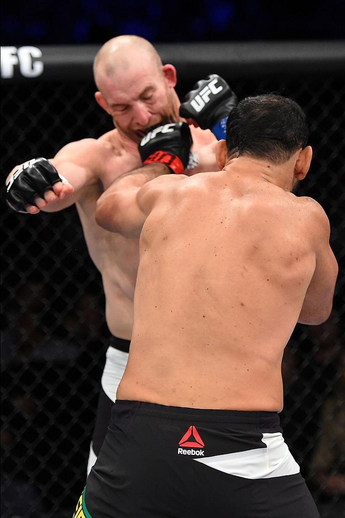 CURITIBA, BRAZIL - MAY 14: (R-L) Antonio Rogerio Nogueira of Brazil punches Patrick Cummins in their light heavyweight bout during the UFC 198 event at Arena da Baixada stadium on May 14, 2016 in Curitiba, Parana, Brazil. (Photo by Josh Hedges/Zuffa LLC