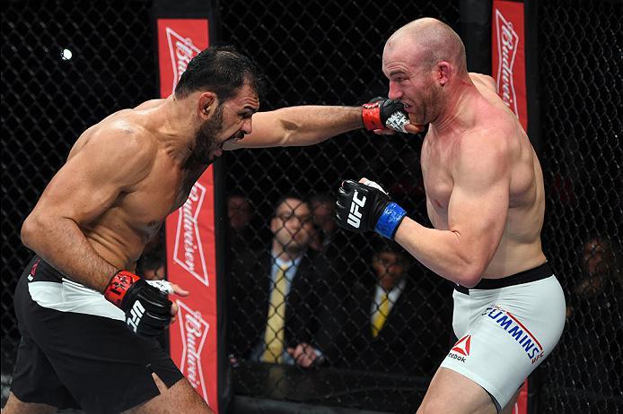 CURITIBA, BRAZIL - MAY 14: (L-R) Antonio Rogerio Nogueira of Brazil punches Patrick Cummins in their light heavyweight bout during the UFC 198 event at Arena da Baixada stadium on May 14, 2016 in Curitiba, Parana, Brazil. (Photo by Josh Hedges/Zuffa LLC