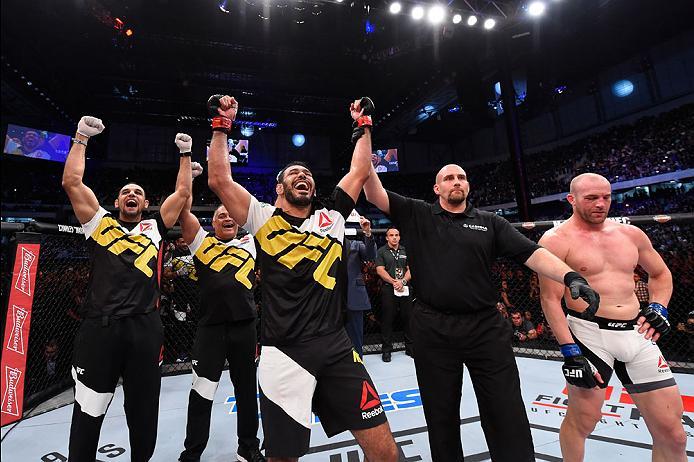 CURITIBA, BRAZIL - MAY 14: (L-R) Antonio Rogerio Nogueira of Brazil celebrates after defeating Patrick Cummins in their light heavyweight bout during the UFC 198 event at Arena da Baixada stadium on May 14, 2016 in Curitiba, Parana, Brazil. (Photo by Jo