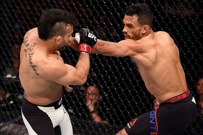 CURITIBA, BRAZIL - MAY 14: (R-L) Rob Font punches John Lineker of Brazil in their bantamweight bout during the UFC 198 event at Arena da Baixada stadium on May 14, 2016 in Curitiba, Parana, Brazil. (Photo by Josh Hedges/Zuffa LLC/Zuffa LLC via Getty Ima