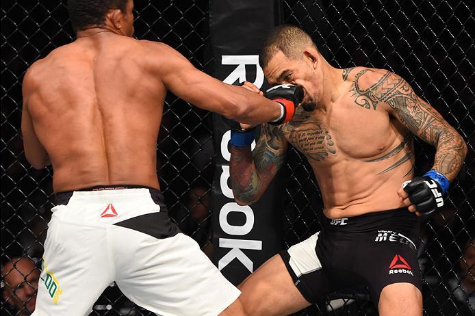 CURITIBA, BRAZIL - MAY 14: (L-R) Francisco Trinaldo of Brazil punches Yancy Medeiros in their lightweight bout during the UFC 198 event at Arena da Baixada stadium on May 14, 2016 in Curitiba, Parana, Brazil. (Photo by Josh Hedges/Zuffa LLC/Zuffa LLC vi