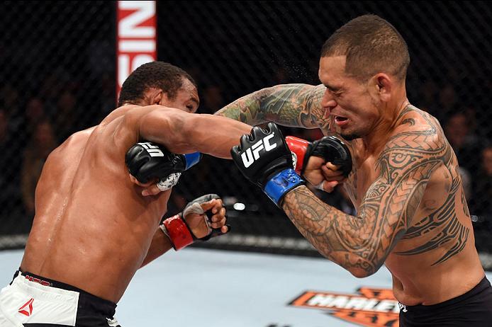 CURITIBA, BRAZIL - MAY 14: (L-R) Francisco Trinaldo of Brazil punches Yancy Medeiros in their lightweight bout during the UFC 198 event at Arena da Baixada stadium on May 14, 2016 in Curitiba, Parana, Brazil. (Photo by Josh Hedges/Zuffa LLC/Zuffa LLC vi