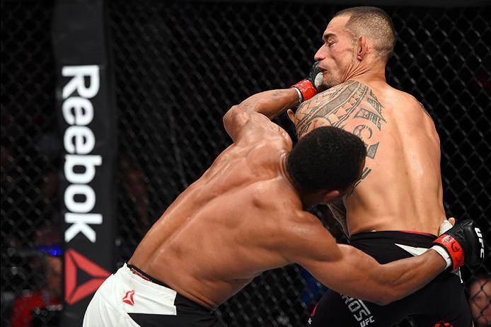 CURITIBA, BRAZIL - MAY 14: (L-R) Francisco Trinaldo of Brazil punches Yancy Medeiros in their lightweight bout during the UFC 198 event at Arena da Baixada stadium on May 14, 2016 in Curitiba, Parana, Brazil. (Photo by Josh Hedges/Zuffa LLC/Zuffa LLC vi