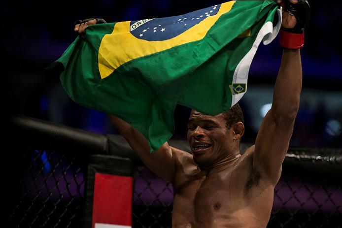 CURITIBA, BRAZIL - MAY 14: Francisco Trinaldo of Brazil celebrates after defeating Yancy Medeiros of the United States in their lightweight bout during the UFC 198 at Arena da Baixada stadium on May 14, 2016 in Curitiba, Brazil. (Photo by Buda Mendes/Zuf