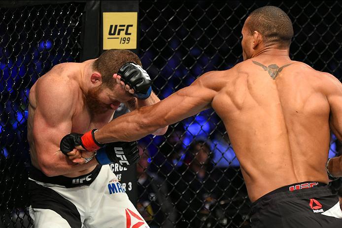 CURITIBA, BRAZIL - MAY 14: (R-L) Thiago Santos of Brazil punches Nate Marquardt in their middleweight bout during the UFC 198 event at Arena da Baixada stadium on May 14, 2016 in Curitiba, Parana, Brazil. (Photo by Josh Hedges/Zuffa LLC/Zuffa LLC via Ge