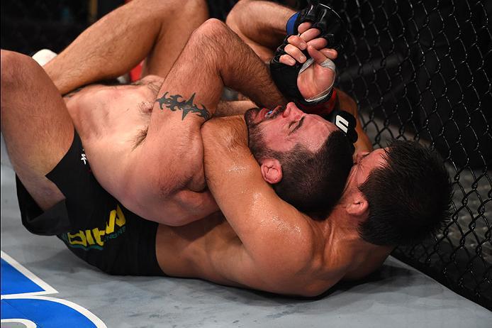 CURITIBA, BRAZIL - MAY 14: (R-L) Demian Maia of Brazil controls the body of Matt Brown in their welterweight bout during the UFC 198 event at Arena da Baixada stadium on May 14, 2016 in Curitiba, Parana, Brazil. (Photo by Josh Hedges/Zuffa LLC/Zuffa LLC