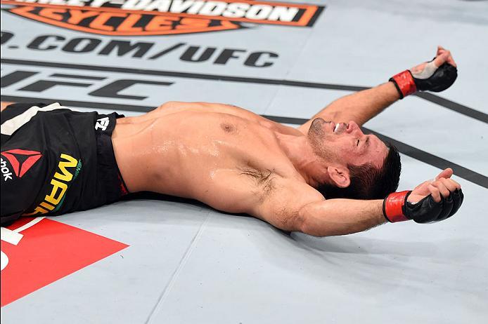 CURITIBA, BRAZIL - MAY 14: Demian Maia of Brazil celebrates after submitting Matt Brown in their welterweight bout during the UFC 198 event at Arena da Baixada stadium on May 14, 2016 in Curitiba, Parana, Brazil. (Photo by Josh Hedges/Zuffa LLC/Zuffa LL