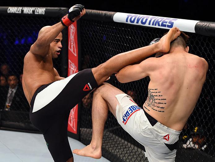 CURITIBA, BRAZIL - MAY 14: (L-R) Warlley Alves of Brazil kicks Bryan Barberena in their middleweight bout during the UFC 198 event at Arena da Baixada stadium on May 14, 2016 in Curitiba, Parana, Brazil. (Photo by Josh Hedges/Zuffa LLC/Zuffa LLC via Get