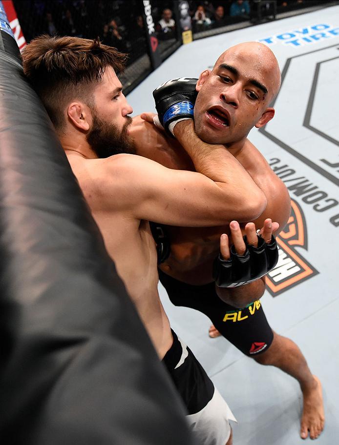 CURITIBA, BRAZIL - MAY 14: (R-L) Warlley Alves of Brazil controls the body of Bryan Barberena in their middleweight bout during the UFC 198 event at Arena da Baixada stadium on May 14, 2016 in Curitiba, Parana, Brazil. (Photo by Josh Hedges/Zuffa LLC/Zu