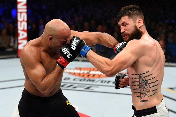 CURITIBA, BRAZIL - MAY 14: (L-R) Warlley Alves of Brazil punches Bryan Barberena in their middleweight bout during the UFC 198 event at Arena da Baixada stadium on May 14, 2016 in Curitiba, Parana, Brazil. (Photo by Josh Hedges/Zuffa LLC/Zuffa LLC via G