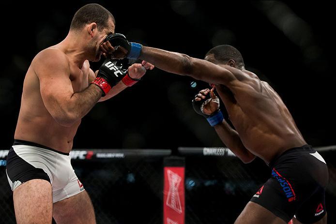 CURITIBA, BRAZIL - MAY 14: Corey Anderson of the United States punches Mauricio Shogun Rua of Brazil in their light heavyweight bout during the UFC 198 at Arena da Baixada stadium on May 14, 2016 in Curitiba, Brazil. (Photo by Buda Mendes/Zuffa LLC/Zuffa