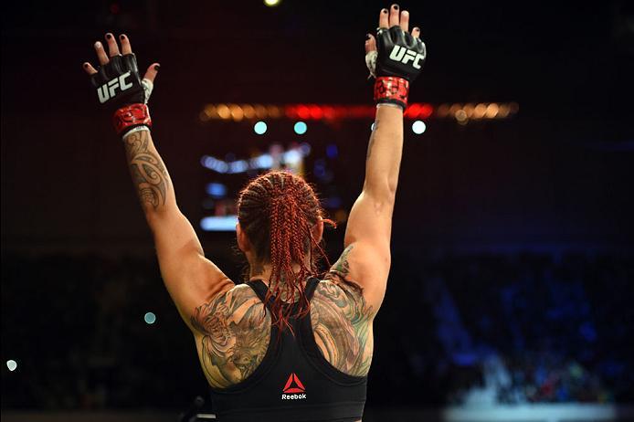 CURITIBA, BRAZIL - MAY 14: Cristiane 'Cyborg' Justino of Brazil celebrates after defeating Leslie Smith in their women's catchweight bout during the UFC 198 event at Arena da Baixada stadium on May 14, 2016 in Curitiba, Parana, Brazil. (Photo by Josh He