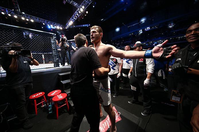CURITIBA, BRAZIL - MAY 14: Stipe Miocic of the United States prepares to enter the Octagon before facing Fabricio Werdum of Brazil in their heavyweight bout during the UFC 198 at Arena da Baixada stadium on May 14, 2016 in Curitiba, Brazil. (Photo by Buda