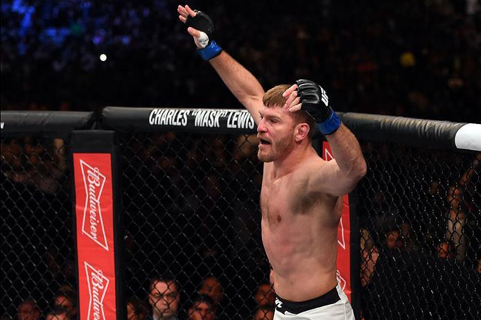 CURITIBA, BRAZIL - MAY 14: Stipe Miocic celebrates after defeating Fabricio Werdum of Brazil by KO in their UFC heavyweight championship bout during the UFC 198 event at Arena da Baixada stadium on May 14, 2016 in Curitiba, Parana, Brazil. (Photo by Jos