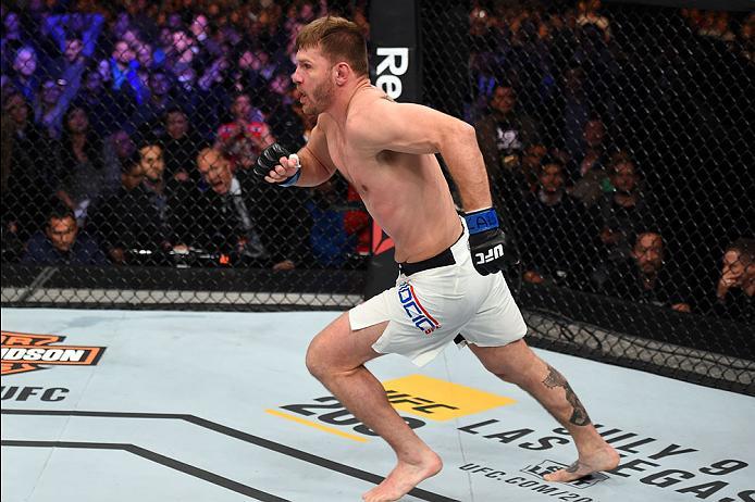 CURITIBA, BRAZIL - MAY 14: Stipe Miocic celebrates after defeating Fabricio Werdum of Brazil by KO in their UFC heavyweight championship bout during the UFC 198 event at Arena da Baixada stadium on May 14, 2016 in Curitiba, Parana, Brazil. (Photo by Jos